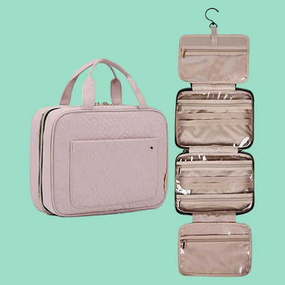 Trousse de toilette voyage homme. Cette trousse gris matelassée est parfaite pour les voyages, offrant un grand espace de rangement et la possibilité d'être suspendue.